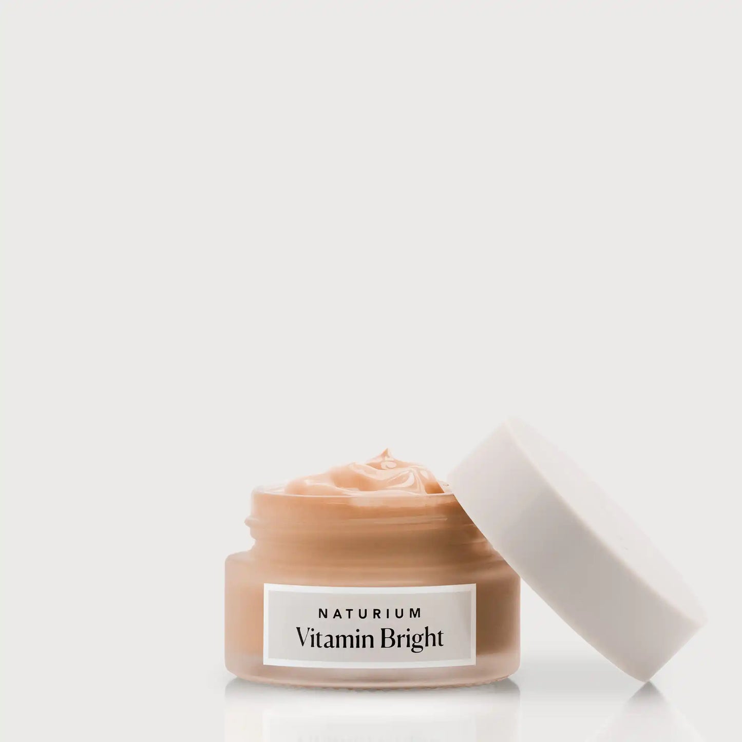 vitamin-bright-illuminating-eye-cream-m3 NATR-VitaminBright_DEEP_Primary_front_openjar_bone.webp